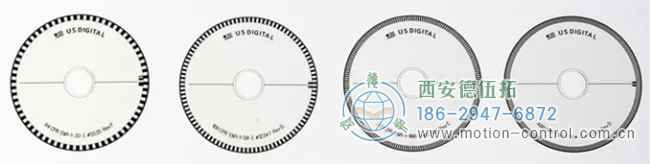 上圖顯示了四個具有不同行數(shù)的光電編碼器盤，可以觀察到行的密度不同。